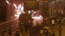 The Muslim Brotherhood and supporters of ousted Egyptian President Mohamed Mursi fire flares and stones at anti-Mursi protesters and riot police during clashes along a road at The Ramsis square which leads to Tahrir Square during a celebration commemorating Egypt's 1973 war with Israel in Cairo October 6, 2013. At least 28 people were killed and more than 90 wounded in clashes during protests in Egypt on Sunday, security sources and state media said, as the crisis since the army seized power three months ago showed no sign of abating.