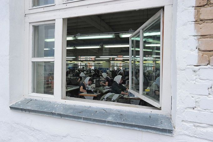 Ivanovo Region prison colony for convicted women IVANOVO REGION, RUSSIA. APRIL 25, 2012. Convicted women at work in the sewing room at Women's Prison Colony No3 of the Ivanovo Region branch of the Russian Federal Service of Execution of Sentences (UFSIN), seen through an open window.