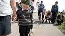 Female Prison Inmates Visit Orphans in Ivanovo Region 6-year-old orphan Petya (foreground) carried a bag of sweets and souvenirs from an inmate of the local 3/3 women's colony which initiated a rehabilitation program for female inmates to meet local children in a care capacity.