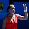 Kiki Bertens of the Netherlands challenges a call during her women's singles match Ana Ivanovic of Serbia at the Australian Open 2014 tennis tournament in Melbourne