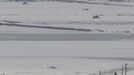 A North Korean soldier (bottom R) patrols along the military fence in the village of Gijungdong, North Korea, in this picture taken from a South Korean observation post, just south of the demilitarized zone separating the two Koreas, in Paju, north of Seoul, February 6, 2013. New York under missile attack is a remote dream for impoverished North Korea, yet that is precisely what the latest propaganda video from the isolated state shows as it readies a third nuclear test. North Korea has trailed plans to carry out a third nuclear test, which experts believe is imminent. REUTERS/Lee Jae-Won (SOUTH KOREA - Tags: MILITARY POLITICS ENERGY) Published: Úno. 6, 2013, 8:07 dop.