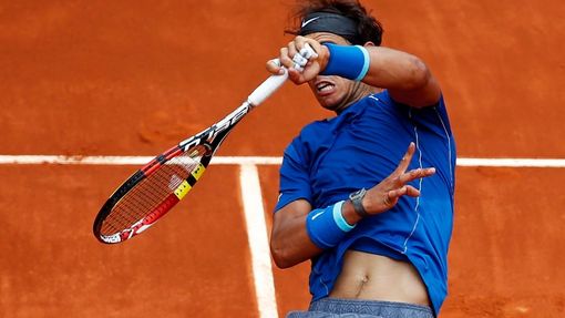 Nadal of Spain returns the ball to Monaco of Argentina during their match at the Madrid Open tennis tournament