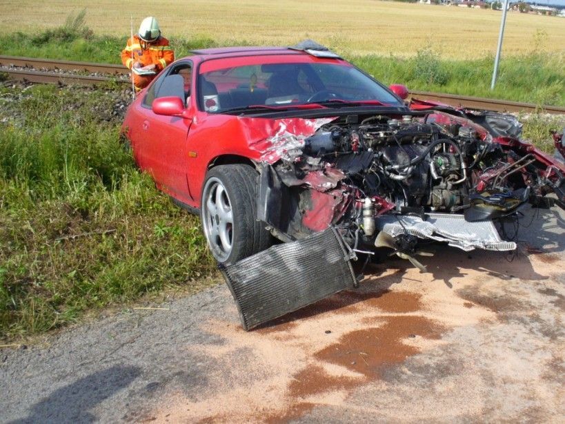 U Rudné se srazilo auto s vlakem