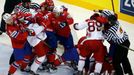 Players of Denmark and Norway fight during the second period of their men's ice hockey World Championship Group A game at Chizhovka Arena in Minsk May 11, 2014. REUTERS/V