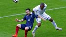 France's Mathieu Valbuena (L) falls beside Wilson Palacios of Honduras as they fight for the ball during their 2014 World Cup Group E soccer match at the Beira Rio stadiu