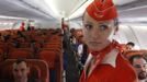 People sit onboard an Aeroflot Airbus A330 plane heading to the Cuban capital Havana at Moscow's Sheremetyevo airport June 27, 2013. Former U.S. spy agency contractor Edward Snowden was believed to still be at a Moscow airport on Thursday and officials said he had not booked a flight out despite pressure from Russian President Vladimir Putin to leave. REUTERS/Maxim Shemetov (RUSSIA - Tags: POLITICS SOCIETY TRANSPORT) Published: Čer. 27, 2013, 10:28 dop.