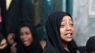 A girl cries after her father was killed by a Saudi-led air strike in Yemen's capital Sanaa July 13, 2015. Saudi-led air raids killed 21 civilians in Yemen's capital Sana