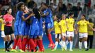 France's team players celebrate.