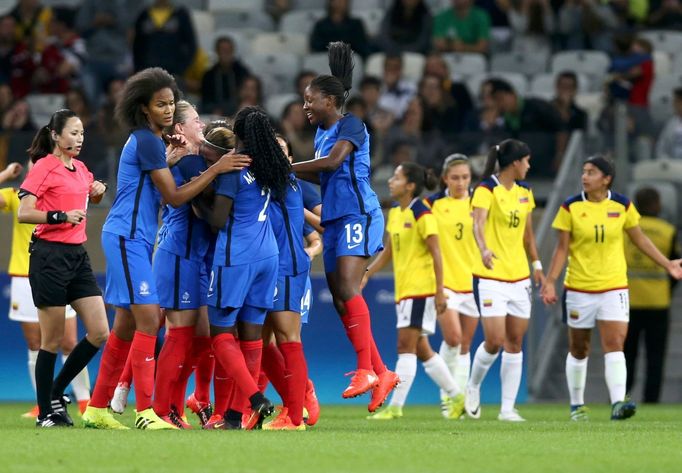 France's team players celebrate.