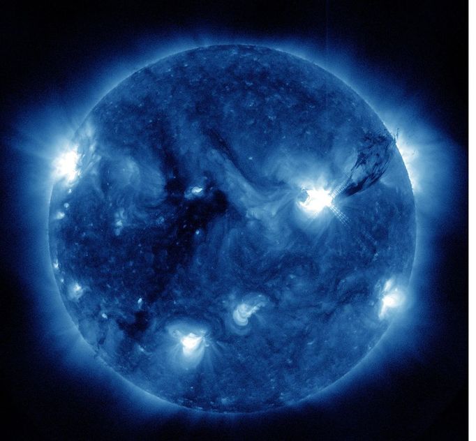 Sunspot 1283 Bristling With Flares A third solar flare and coronal mass ejection has erupted from sunspot 1283. The third came on September 7 at 6:36 PM ET, and was categorized as an X1.8 by the GOES spacecraft, making it the second X-class flare within 24 hours, the prior being an X2.1 on Sept. 6, 2001 at 6:20 PM ET. Pictured here, leaping off the sun to the right is a giant plume of solar material – ionized gas called plasma – from sunspot 1283. This sunspot ejected three solar flares and three coronal mass ejections from September 5 to September 7, 2011. The picture here, captured by the Solar Dynamics Observatory, shows light with a wavelength of 335 Angstroms. Credit: NASA/SDO/AIA