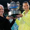 Mattek-Sands of the U.S. and Safarova of Czech Republic hold their trophy after winning their women's doubles final match against Zheng of China and Chan of Taiwan at the Australian Open tennis tourna
