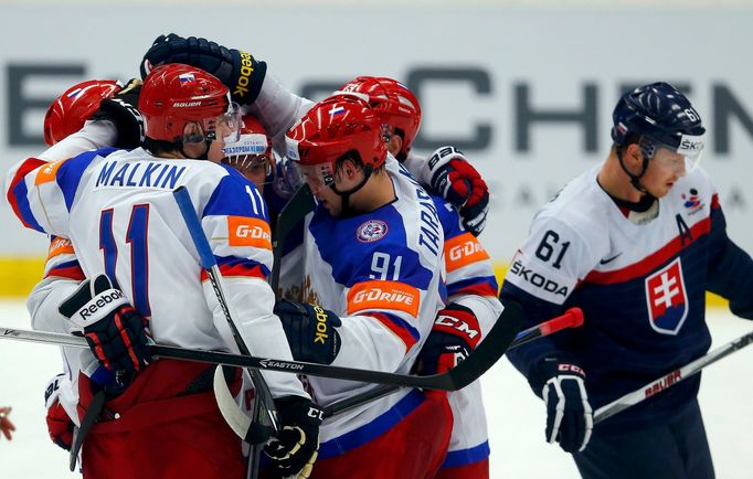 Russia's players celebrate their first goal against Slovakia during their Ice Hockey World Championship game at the CEZ arena in Ostrava