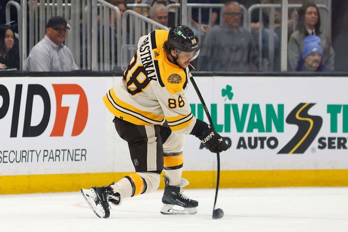 Nov 18, 2023; Boston, Massachusetts, USA; Boston Bruins right wing David Pastrnak (88) lets go a shot against the Montreal Canadiens during the first period at TD Garden.