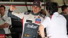 Sauber Formula One driver Adrian Sutil of Germany gestures as he speaks to a crew member during the first practice session of the Bahrain F1 Grand Prix at the Bahrain Int