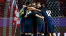 Atletico players celebrate at the end of the game