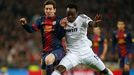 Real Madrid - FC Barcelona: Michael Essien -  Lionel Messi