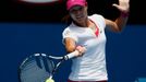 Li Na of China hits a return to Belinda Bencic of Switzerland during their women's singles match at the Australian Open 2014 tennis tournament in Melbourne January 15, 20