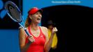 Maria Sharapova of Russia celebrates after defeating Eugenie Bouchard of Canada in their women's singles quarter-final match at the Australian Open 2015 tennis tournament