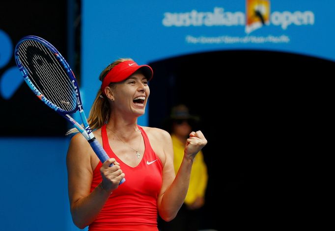 Maria Sharapova of Russia celebrates after defeating Eugenie Bouchard of Canada in their women's singles quarter-final match at the Australian Open 2015 tennis tournament