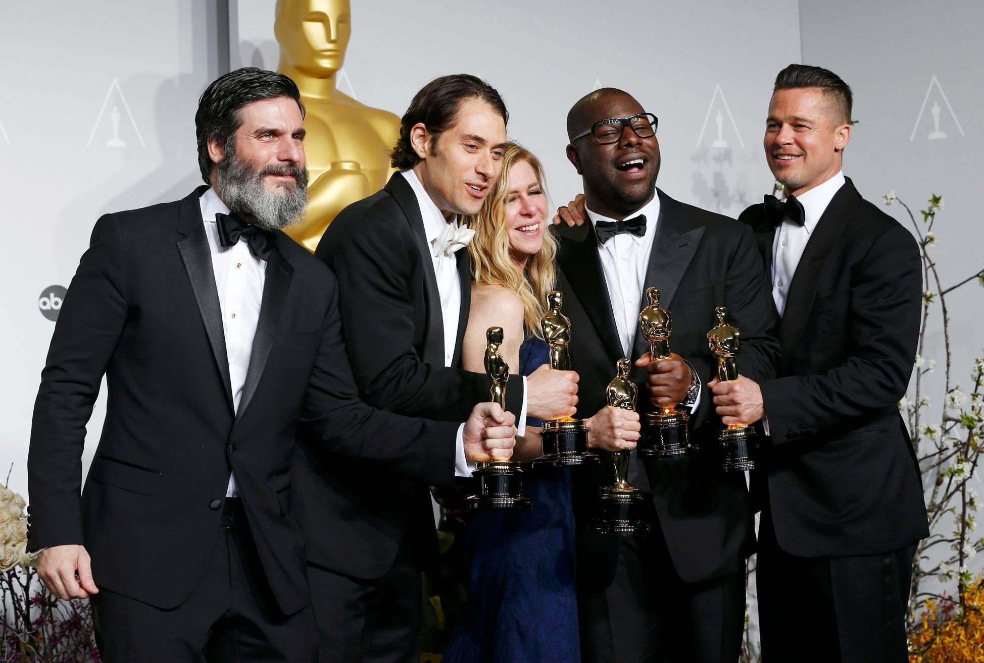 Producers Anthony Katagas, Jeremy Kliner, Dede Gardner, Steve McQueen and Brad Pitt pose with their awards for best picture for &quot;12 Years a Slave&quot; at the 86th Academy Awards in Hollywood