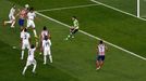 Atletico Madrid's Diego Godin (2nd L) heads the ball to score a goal against Real Madrid during their Champions League final soccer match at the Luz Stadium in Lisbon May