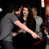 Recording artist Lorde is escorted backstage with her award for best rock video during the 2014 MTV Video Music Awards in Inglewood