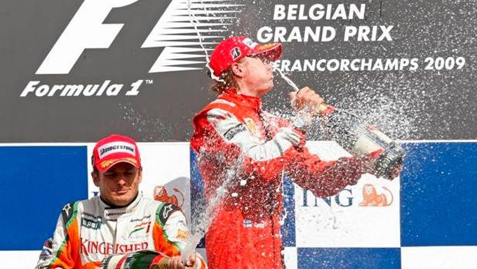 Kimi Räikkönen Giancarlo Fisichella se radují z úspěchu na Velké ceně Belgie