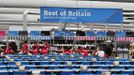 Athletes eat in a dining area of the Athletes Village at Olympic Park in Stratford in east London July 23, 2012. REUTERS/Toby Melville (BRITAIN - Tags: SPORT OLYMPICS) Published: Čec. 23, 2012, 3:17 odp.