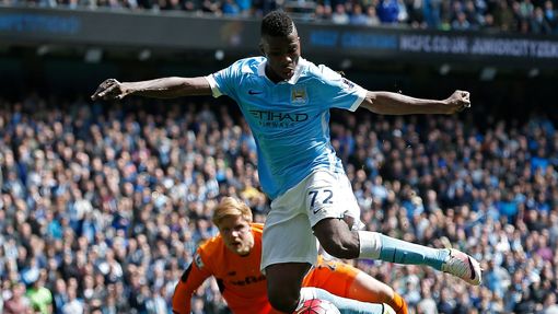 Kelechi Iheanacho rounds Stoke's Jakob Haugaard to score the fourth goal for Manchester Cit