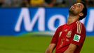 Spain's Sergio Busquets reacts after missing a chance to score a goal during their 2014 World Cup Group B soccer match against Chile at the Maracana stadium in Rio de Jan