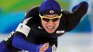 Li Kang-sok reprezentující Koreu při sprintu rychlobruslařů na 500 metrů.