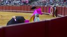 Spanish matador Javier Castano performs a pass to a bull during a bullfight in The Maestranza bullring in Seville