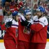 Nemec of the Czech Republic celebrates his goal against Austria with team mates Simon and Hejda during their Ice Hockey World Championship game at the O2 arena in Prague