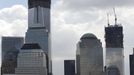 The Space Shuttle Enterprise, passes lower Manhattan and the still under construction 1 World Trade Center tower (C) as it rides on a barge in New York harbor, June 6, 2012. The Space Shuttle Enterprise was being moved up the Hudson River to be placed at the Intrepid Sea, Air and Space Museum. REUTERS/Mike Segar (UNITED STATES - Tags: TRANSPORT SCIENCE TECHNOLOGY) Published: Čer. 6, 2012, 6:09 odp.