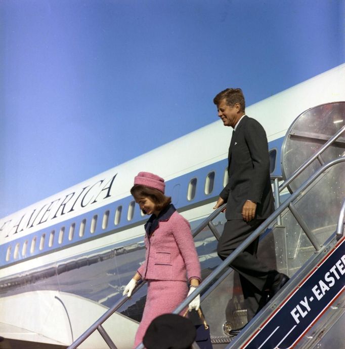 Former U.S. President John F. Kennedy and first lady Jacqueline Kennedy descend the stairs from Air Force One after arriving at Love Field in Dallas,Texas, in this handout image taken on November 22, 1963. Friday, November 22, 2013, will mark the 50th anniversary of the assassination of President Kennedy.