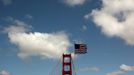 The U.S. flag flies near the South Tower of the Golden Gate Bridge in San Francisco, California May 25, 2012. The iconic landmark will observe its 75th anniversary with celebrations scheduled on Sunday. REUTERS/Robert Galbraith (UNITED STATES - Tags: SOCIETY) Published: Kvě. 25, 2012, 9:35 odp.