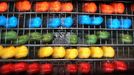 Peak season at egg dye-works Dyed eggs roll on a conveyor belt in the Behan egg dye-works in Thannhausen, Germany, 30 March 2012. Its peak season at the dyeworks shortly before Easter. Around 180,000 eggs are boiled and dyed here daily. Photo: Karl-Josef Hildenbrand