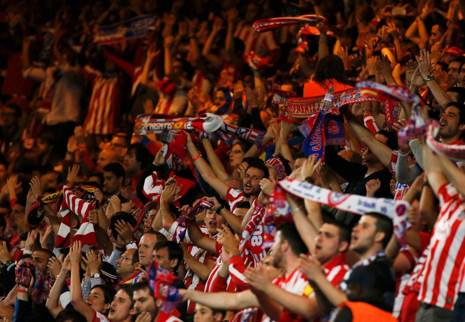 Atletico's supporters cheer during their Champions League semi-final second leg soccer match against Chelsea at Stamford Bridge in London