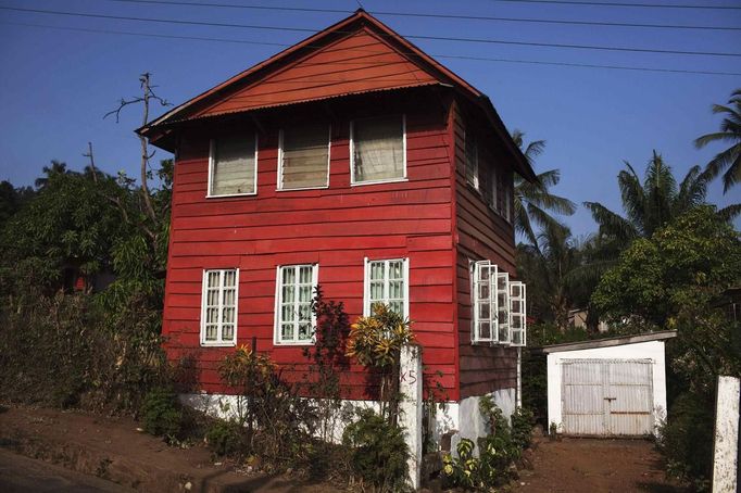 Painted wooden planks cover facade of traditional colonial-era Board House on King Street in Sierra Leone's capital Freetown