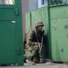 Ukrajina - ukrajinský voják bojuje se separatisty v Ilovajsku (26. srpna)