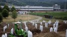 A memorial center is seen in Potocari near Srebrenica, July 6, 2012. During the war, Bosnian Serb forces commanded by General Ratko Mladic killed up to 8000 Muslim men and boys in the Srebrenica area. Bosnian Serb army commander Mladic, who personally witnessed the capture of Srebrenica, was arrested in Serbia in May 2011 after 16 years on the run. He is accused of genocide for orchestrating the massacre and for his role in the siege of Bosnia's capital Sarajevo. Some 520 recently discovered Bosnian Muslim victims' remains from the Srebrenica massacre will be buried on July 11 at the Memorial center in Potocari. The International Commission for Missing Persons has so far identified more than 7,000 Srebrenica victims. Picture taken July 6, 2012. REUTERS/Dado Ruvic (BOSNIA AND HERZEGOVINA - Tags: CIVIL UNREST CITYSPACE CRIME LAW) Published: Čec. 9, 2012, 5:15 odp.