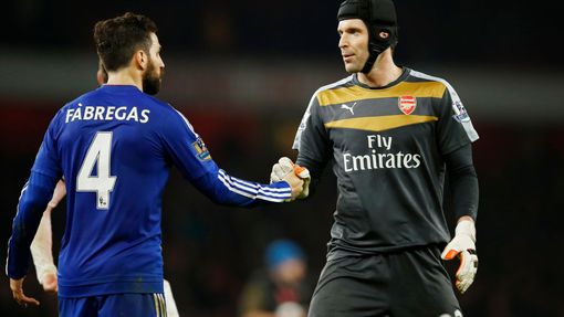 Chelsea's Cesc Fabregas with Arsenal's Petr Cech