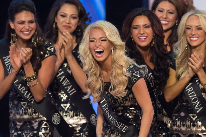 Miss Tennessee Hayley Lewis reacts as she enters the round of top 16 contestants during the final 2015 Miss America Competition in Atlantic City, New Jersey