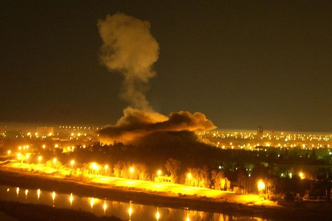 Smoke billows from an explosion in Iraqi President Saddam Hussein's presidential palace in Baghdad during a coalition air raid early 02 April 2003. The war on Iraq which officially began March 20th has claimed the lives of many Iraqi civilians, as US-led forces carry out air raids and ground assaults.