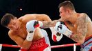 World champion Gennadiy Golovkin of Kazakhstan (L) punches Martin Murray of England during the WBA-WBC-IBO Middleweight World Championship in Monte Carlo, early February