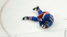 New York Rangers left wing Chris Kreider lies on the ice after a collision while playing the Boston Bruins in the third period of Game 3 of their NHL Eastern Conference s