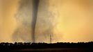 ¨Tornado Moving Across Farmland in Oklahoma An F3 class tornado moves across farmland in Arnett, Oklahoma. Strong tornadoes like this one usually develop from a specific type of thunderstorm called supercells, which contain mesocyclones. Mesocyclones are a large area of rotating updraft in the atmosphere, between 1 and 6 miles across, that can cause tornadoes to form. | Location: Arnett, Oklahoma, USA.