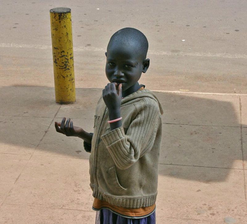 Uganda - Malá žebračka