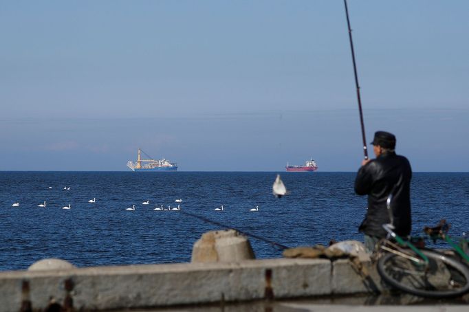 Pipe-laying vessel Akademik Cherskiy owned by Gazprom (L), which Russia may use to complete construction of the Nord Stream 2 gas pipeline, is seen in a bay near the Balt