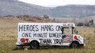 A message is painted on a truck near where the High Park fire has burned out, west of Fort Collins, in Colorado June 18, 2012. The fire has charred more than 85 square miles (200 square km) and sent a plume of smoke billowing thousands of feet into the air. The lightning-sparked blaze has destroyed 181 homes since it was reported June 9, ranking it as the most destructive wildfire on record in Colorado. REUTERS/Rick Wilking (UNITED STATES - Tags: DISASTER ENVIRONMENT) Published: Čer. 18, 2012, 11:31 odp.